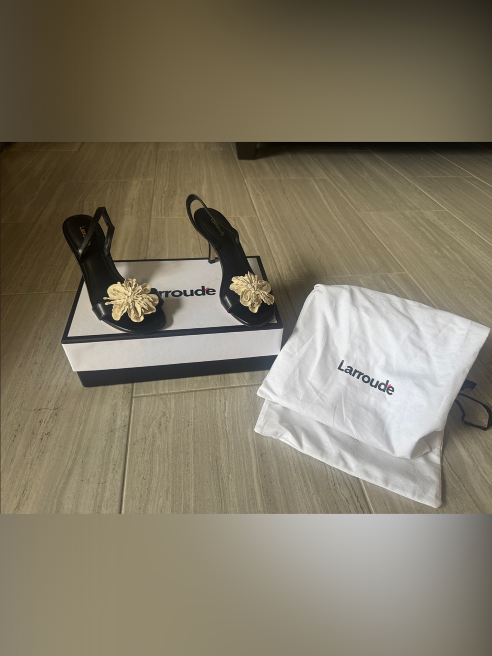 Larroude Black Sandal with Cream Flower Accent